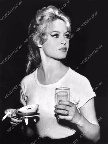 candid Brigitte Bardot enjoys a vigarette and a drink 8b20-5369