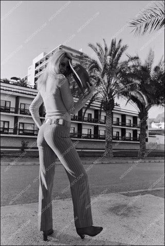 beautiful Brigitte Bardot with cowboy boots and hat 8b20-5378