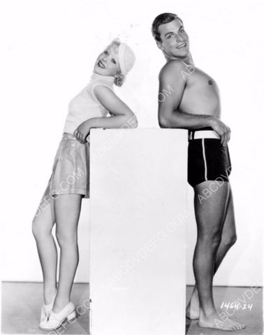 Mary Carlisle and Buster Crabbe show off their new summer styles 8b20-5634