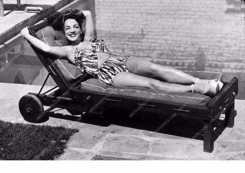 Carmen Miranda at home sunbathing by the pool 8b20-5684