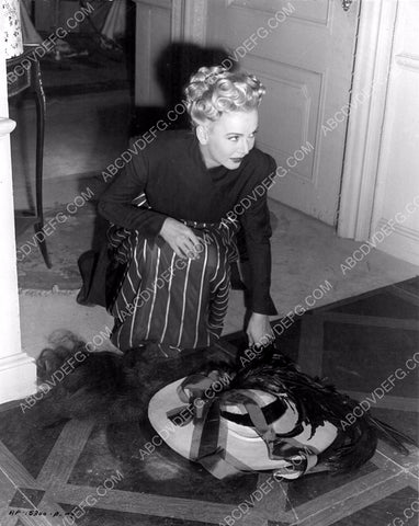 Carole Landis wants to know who stepped on her hat 8b20-5922