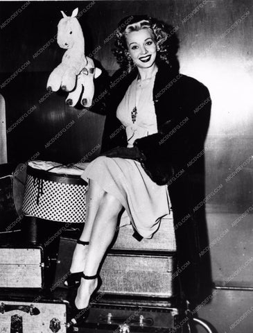 Carole Landis a lot of luggage and stuffed animal 8b20-5929