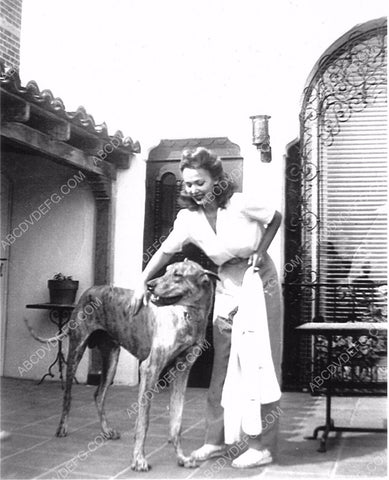 Carole Landis petting her dog 8b20-5989