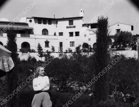 Carole Lombard in jodpers outside their home maybe 8b20-6057