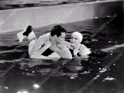 Cary Grant and some girl in the pool 8b20-6176