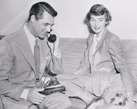 Cary Grant on telephone with wife and dog 8b20-6184