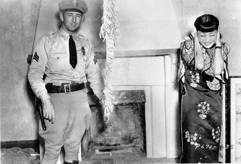 Anna May Wong & police sergeant set of a bunch o firecrackers 8b20-6607