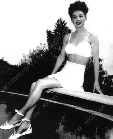 Carole Landis in swimwear sitting on the diving board 8b20-6842