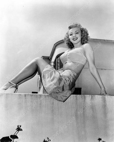 sexy Carole Landis sitting on a wall 8b20-6847