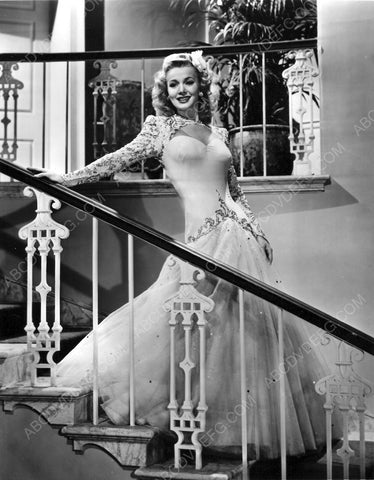 Carole Landis in white dress on the stairs 8b20-6868