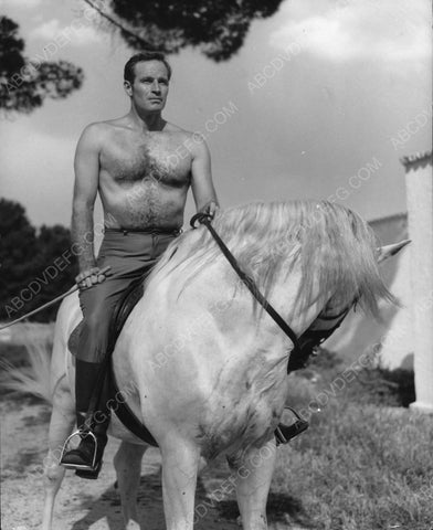 Charlton Heston sitting on a horse 8b20-7072
