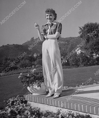 candid Claudette Colbert in her backyard 8b20-7776