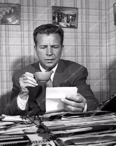 Dick Powell reads the mail with a cup of coffee 8b20-8205