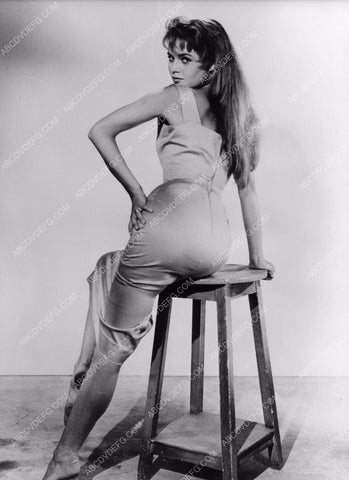 Brigitte Bardot seated on a stool 8b20-8637