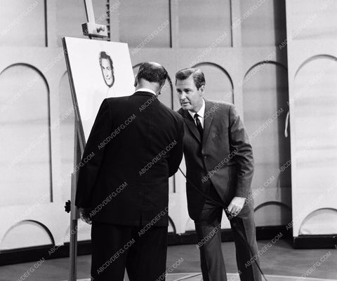 Bob Barker and contestant on TV game show 8b20-8665