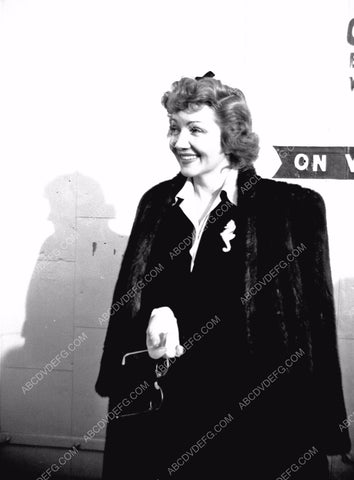 candid Claudette Colbert arrives at the studio 8b20-8836
