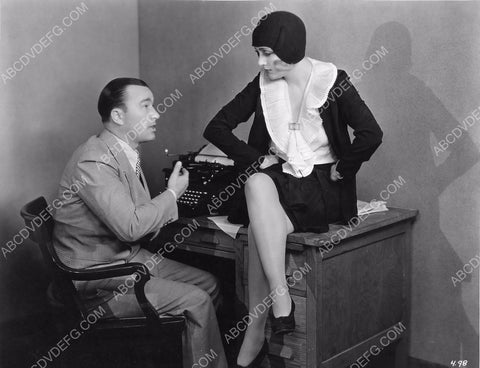 Carole Lombard sits on desk by Robert Armstrong maybe 8b20-9262