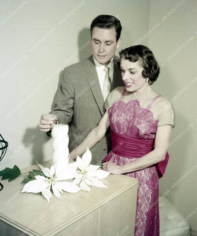 Bob Barker and wife lighting a candle 8b20-9695