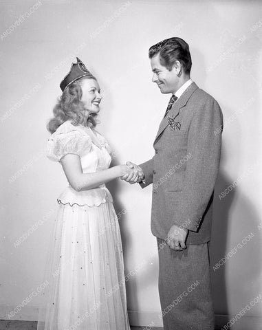 Glenn Ford crowning unknown Columbia starlet gford-02