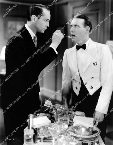 crp-11016 1935 Franchot Tone feeding the waiter film One New York Night crp-11016