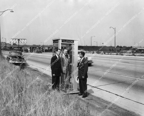 crp-11489 1954 news photo historic Los Angeles Kenneth Hahn, John Anson Ford, Bert Hinds install phone booth by freeway crp-11489