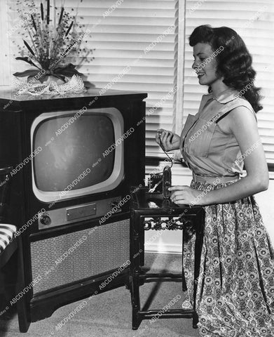crp-11514 1950's cute teen girl takes picture of her new television set w her camera crp-11514