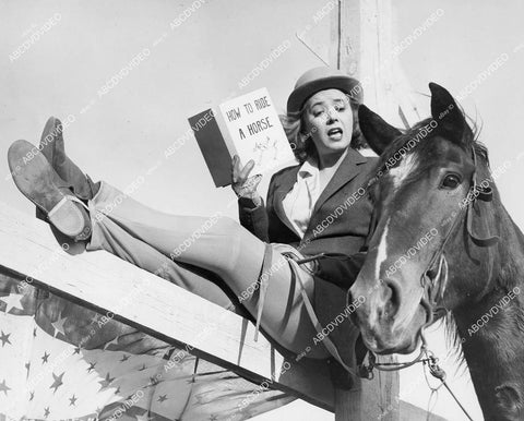 crp-00115 Jeff Donnell reads How to Ride a Horse film Throw a Saddle on a Star crp-00115