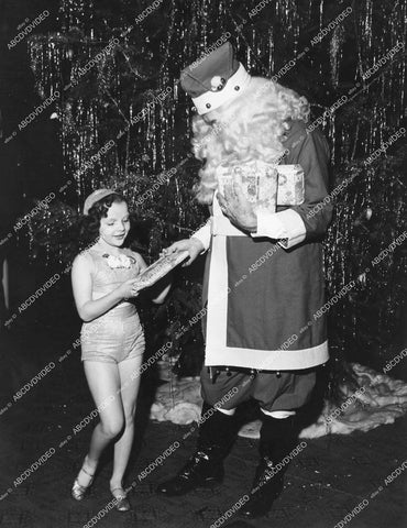 crp-11688 1930's vintage Americana cute little girl gets present from department store Santa Claus crp-11688