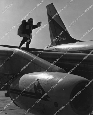 crp-11691 1959 Santa Claus gets Christmas present of new DC-8 Jet to make job easier crp-11691