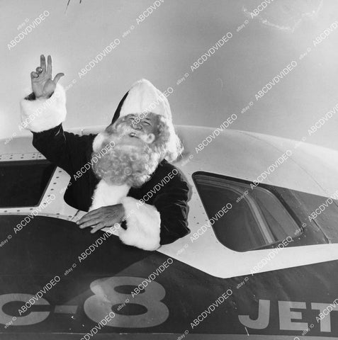 crp-11692 1959 Santa Claus gets Christmas present of new DC-8 Jet to make job easier crp-11692