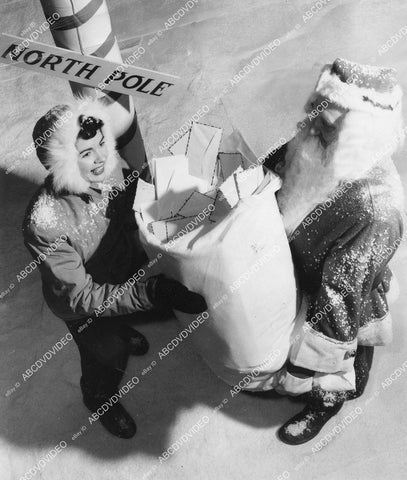 crp-11696 1940's Pan American Airways stewardess Genevieve Codd helps Santa Claus w mail delivery crp-11696