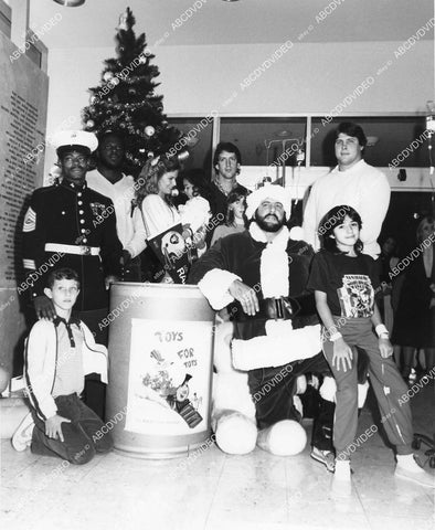 crp-11697 1980's NFL star Lyle Alzado Los Angeles raiders and friends USMC Toys for Tots charity crp-11697