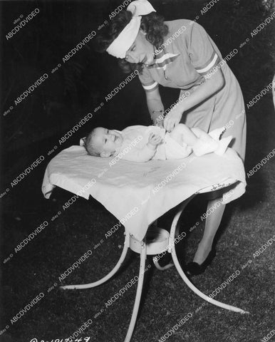 crp-12083 1944 Joan Davis changing a diaper film Beautiful But Broke crp-12083
