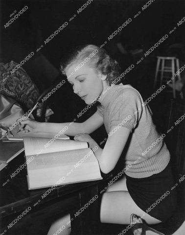 crp-01234 1937 chorus girl takes break does some reading MGM Studios film Broadway Melody of 1938 crp-01234