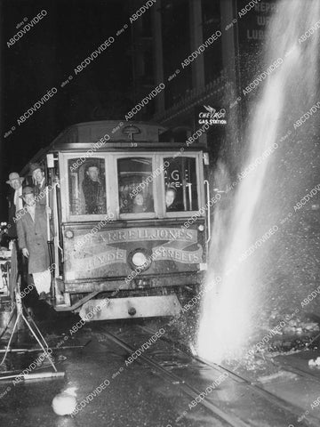 crp-12435 1951 news photo San Francisco streetcar slowed up by blown water main crp-12435