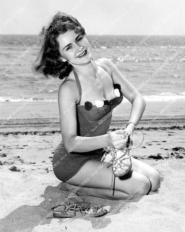 crp-13083 1952 Shoe-Shoe Baby cute Joyce Sandberg in new swimsuit in sand at Miami Beach vintage pinup pose crp-13083