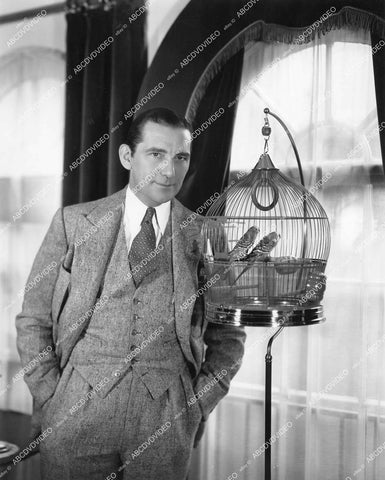 crp-13166 1930's William Stage Boyd at home w his parrots & parakeets crp-13166