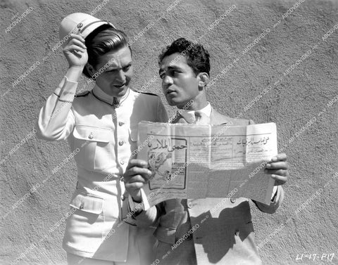crp-13321 1932 Alexander Kirkland has Abdulla translate Arabian newspaper film Passport to Hell maybe crp-13321