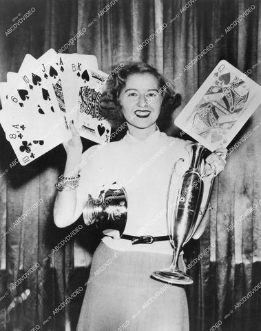 crp-13604 1939 news photo Mrs Ralph C Young leading contract bridge player w trophies & giant cards crp-13604