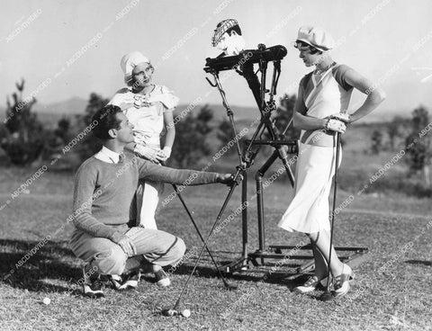 crp-13619 1930 Robert Montgomery, Dorothy Jordan, Penny Singleton practice golf w vintage swing machine film Love in the Rough crp-13619