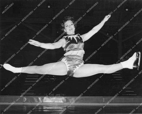 crp-13670 1940's ice skater Janet Champion flies through air doing the splits crp-13670