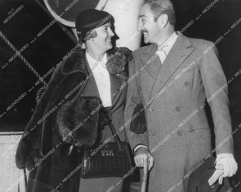 crp-13793 1936 news photo Adolphe Menjou & wife arrive by boat crp-13793