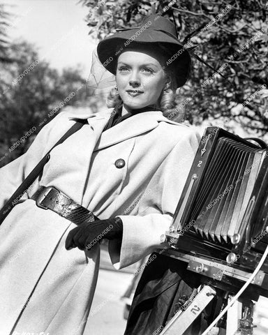 crp-14192 1946 lovely Leslie Brooks standing by still camera on set film The Man Who Dared crp-14192