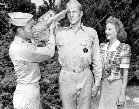 crp-14338 1943 candid Lt Walter E O'Brien demos proper salute Bruce Bennett, Evelyn Keyes film There's Something About a Soldier crp-14338
