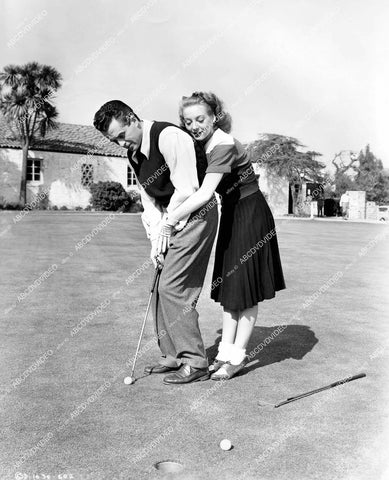 crp-14573 1946 Larry Parks, Evelyn Keyes play golf on putting green film The Jolson Story crp-14573