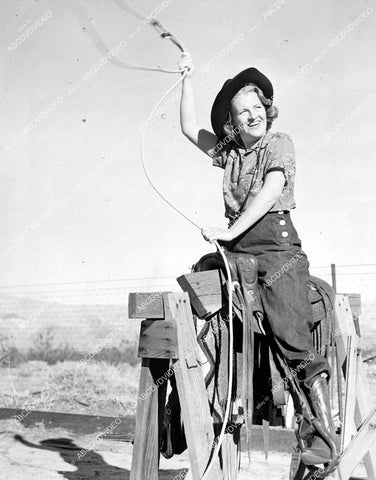 crp-15603 1939 Gracie Fields on saddle and saw horse in Palm Springs Calif Bar H Dude Ranch crp-15603
