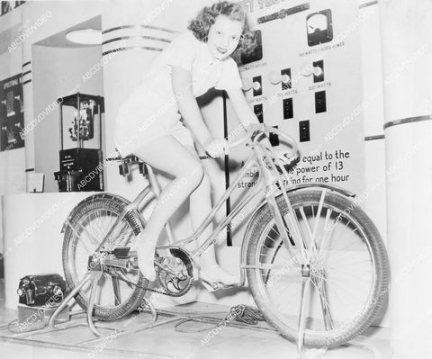 crp-01576 1940's Gertrude Bogard Phil Spitalny All Girl Band member pedals bicycle for electricity cool pic crp-01576