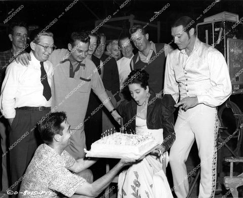 crp-15778 1952 candid Jody Lawrence w birthday cake & director Phil Karlson, Anthony Dexter & crerw film The Brigand crp-15778