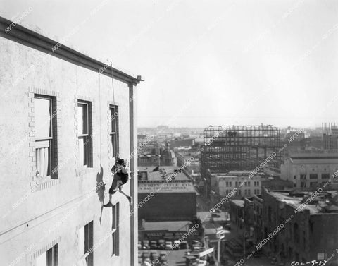 crp-16111 circa 1933 Mickey Rooney dangling from building over vintage Los Angeles unknown Mickey McGuire short subject film crp-16111
