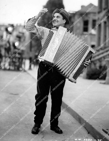 crp-16474 1937 Leo Carrillo playing the accordion film 52nd Street crp-16474